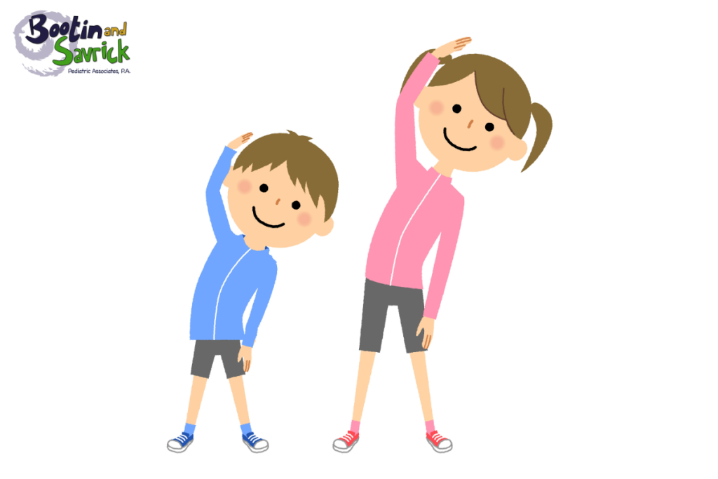 Two kids doing warm-up exercises before playing sports to allow their lungs to adjust to the activity and reduce asthma symptoms in Houston, Texas.